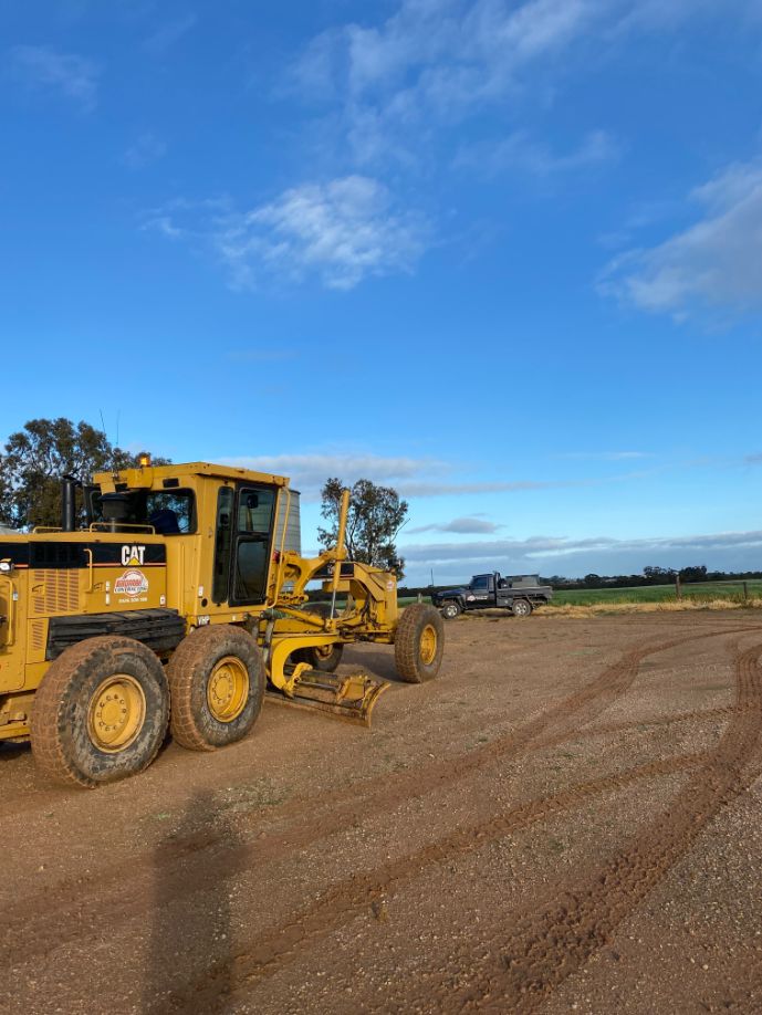 An excavator working at green field area